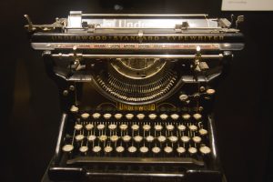 Dramatically lit old-fashioned typewriter.
